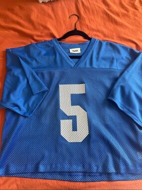 Elwood Oversize Crop Mesh Football Jersey in blue.